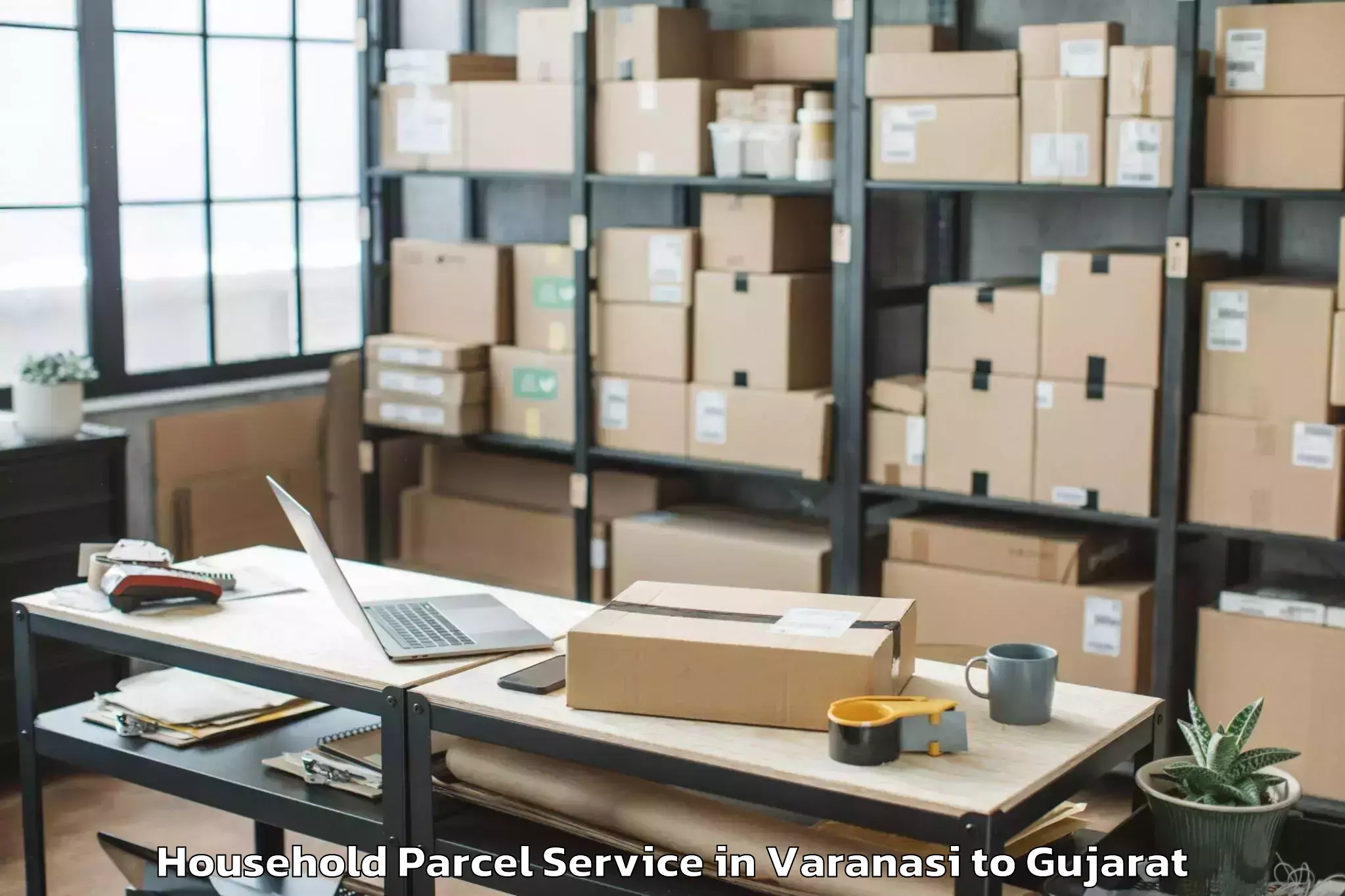 Book Varanasi to Jhulasan Household Parcel Online